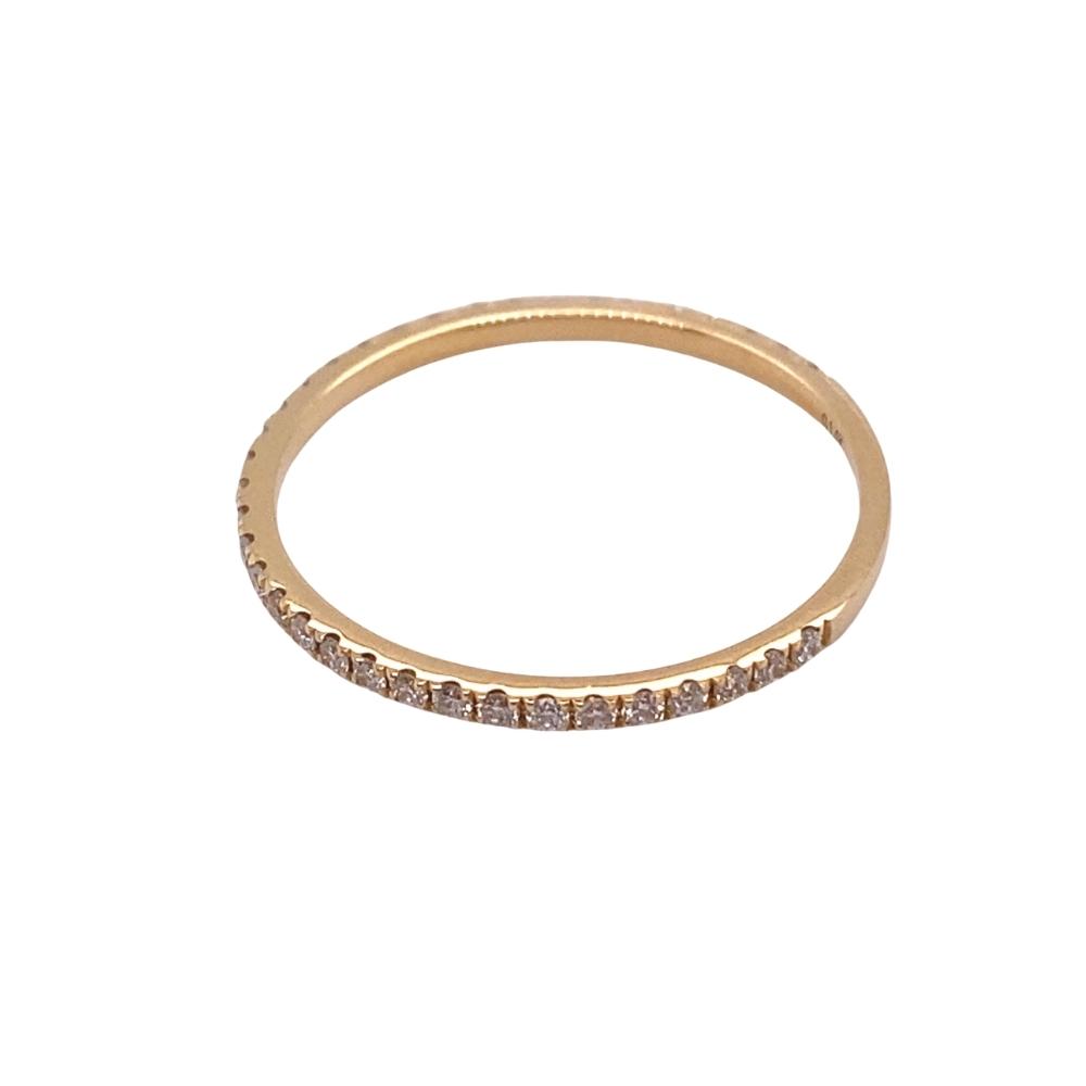 a gold ring with small diamonds on it