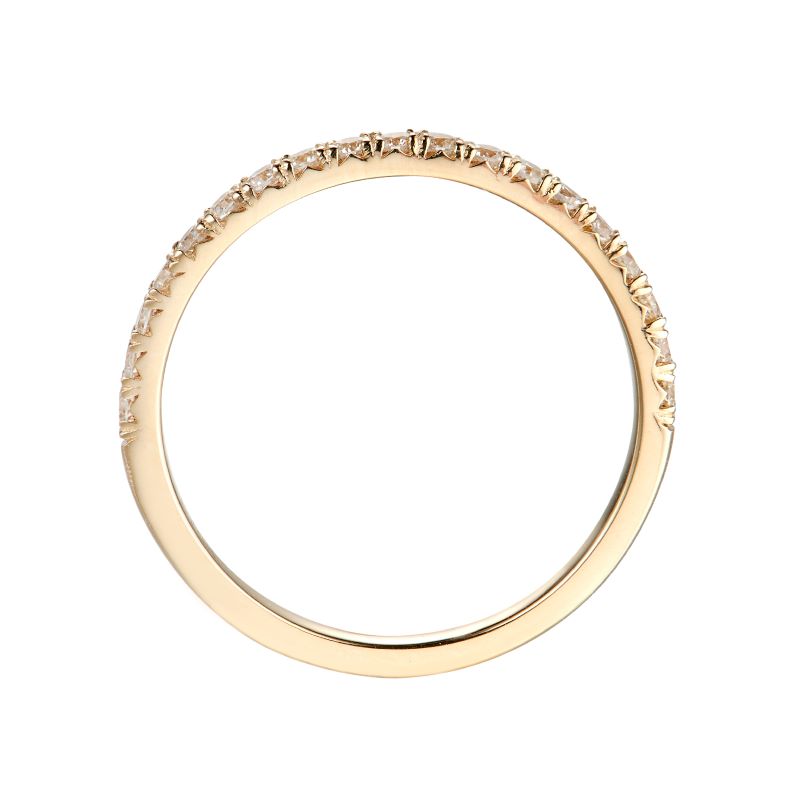 a yellow gold wedding band with small diamonds