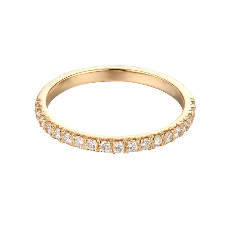 a yellow gold band with white diamonds