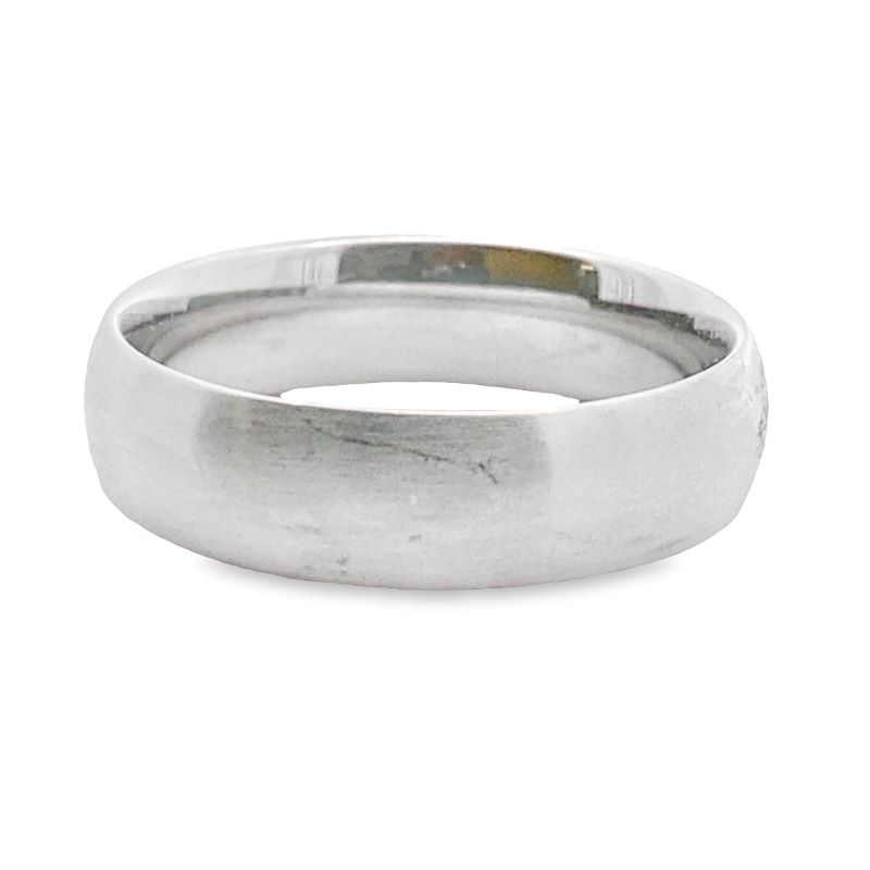 a white gold wedding ring with a rounded surface
