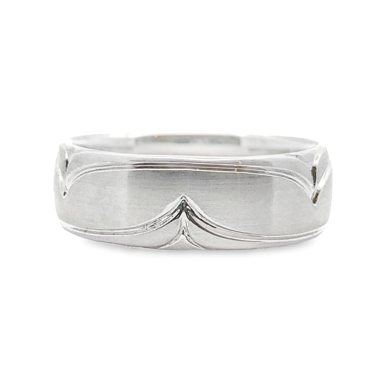 a white gold wedding band with wavy design
