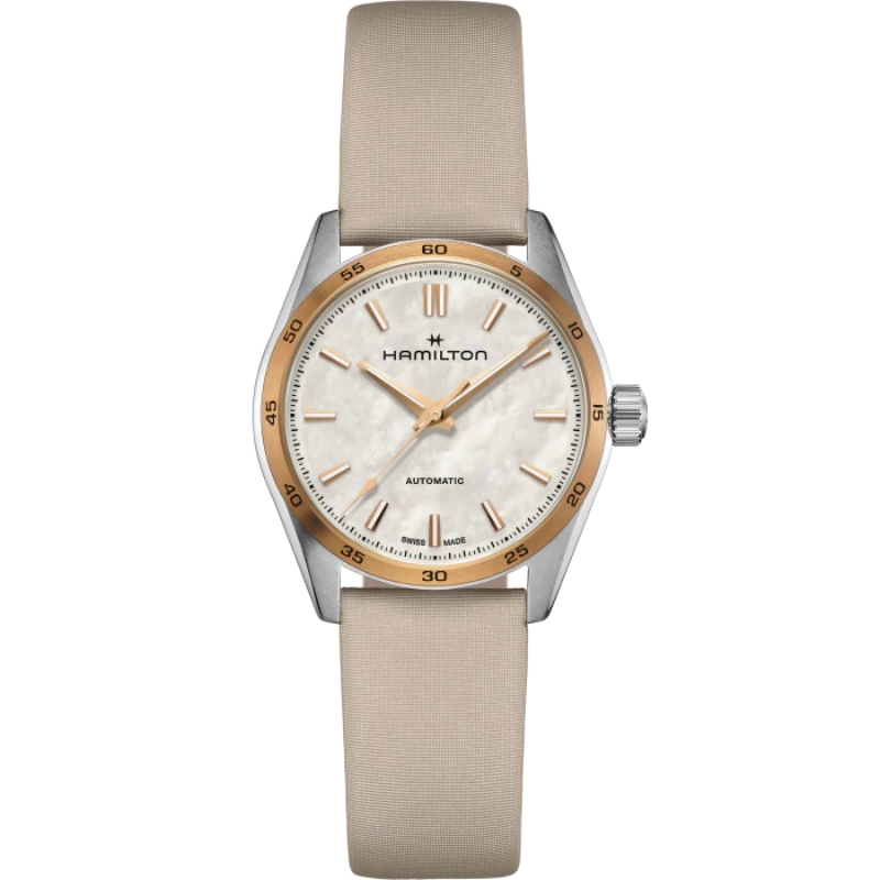 a watch with a white dial and beige leather strap