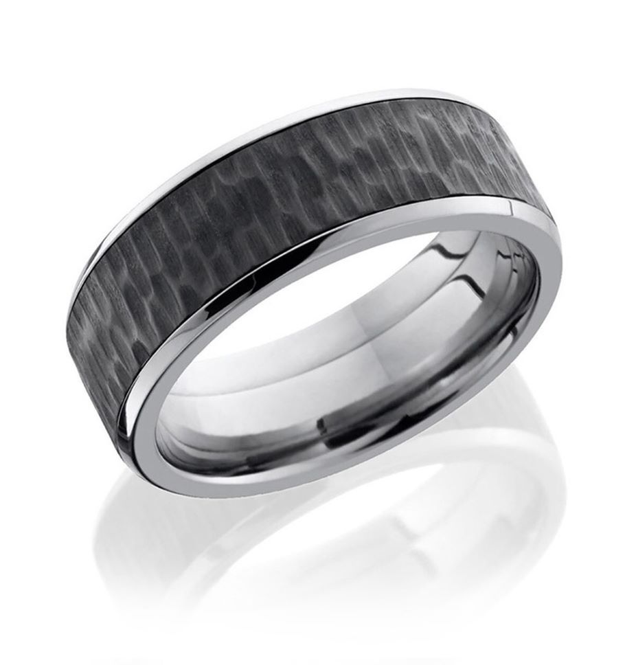 a wedding band with black carbon inlay