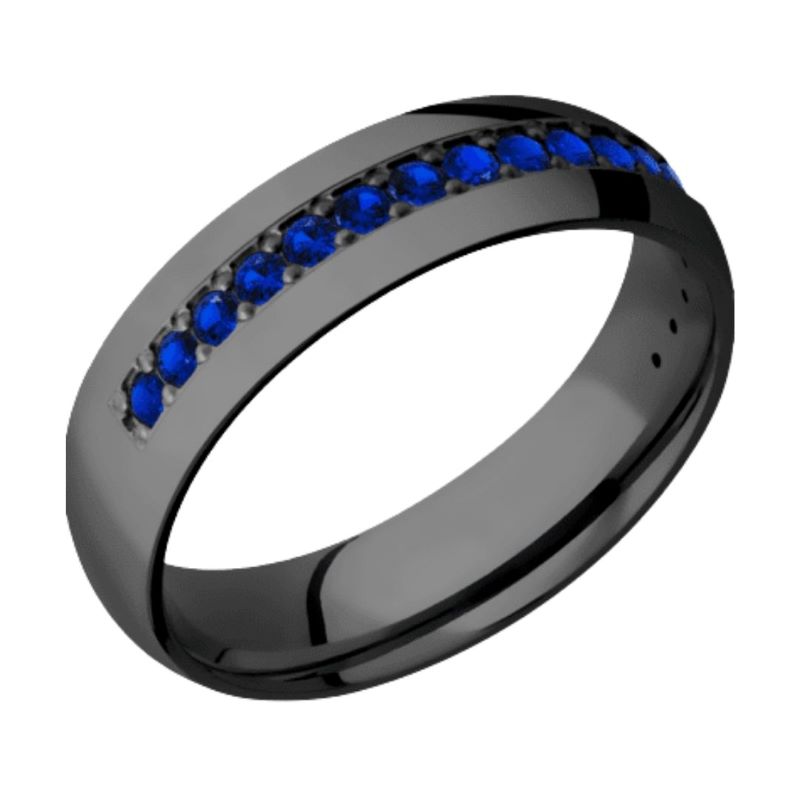 a black ring with blue sapphire stones