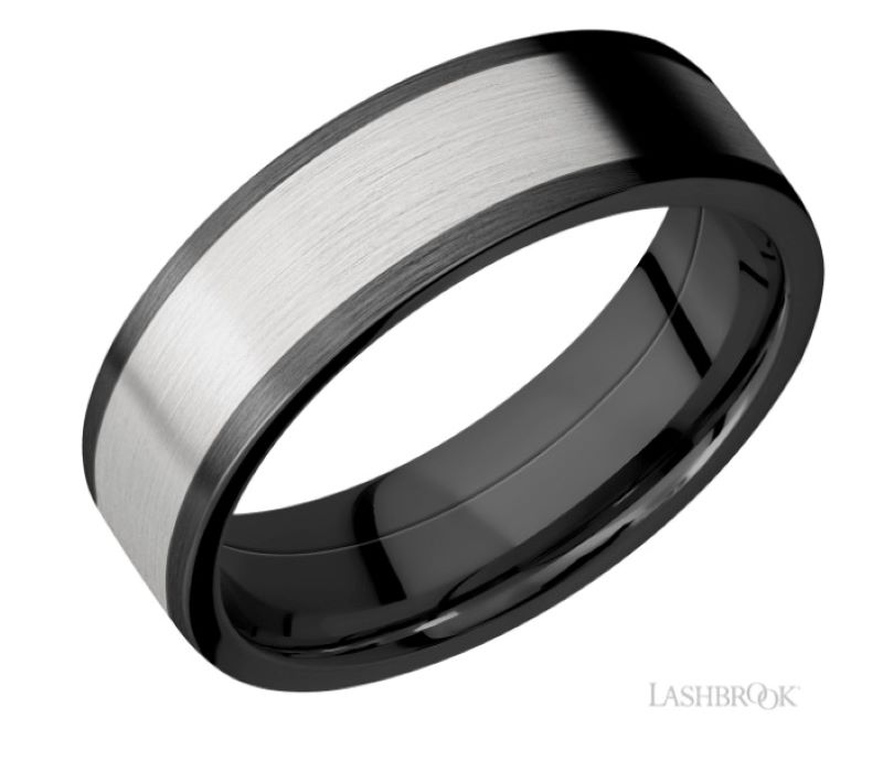a black and white wedding band with a brushed finish