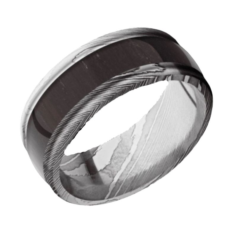 a black and white wedding ring with an intricate design