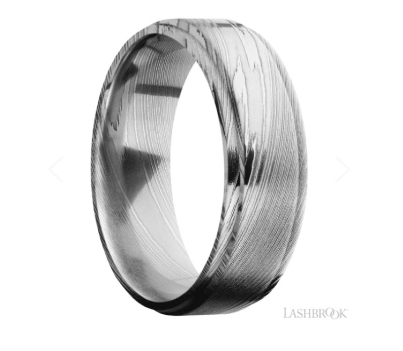 a wedding ring with an intricate design
