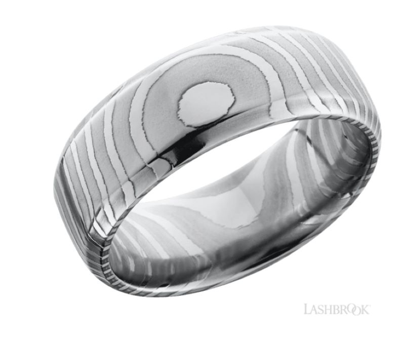 a wedding band with an etched design