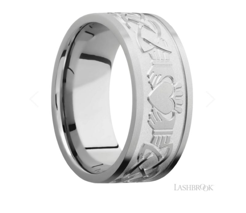 a wedding ring with the word love engraved on it