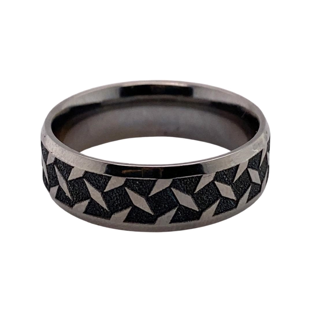 a black and silver ring with geometric design