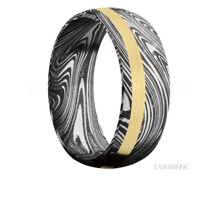 a wedding ring with black and yellow stripes