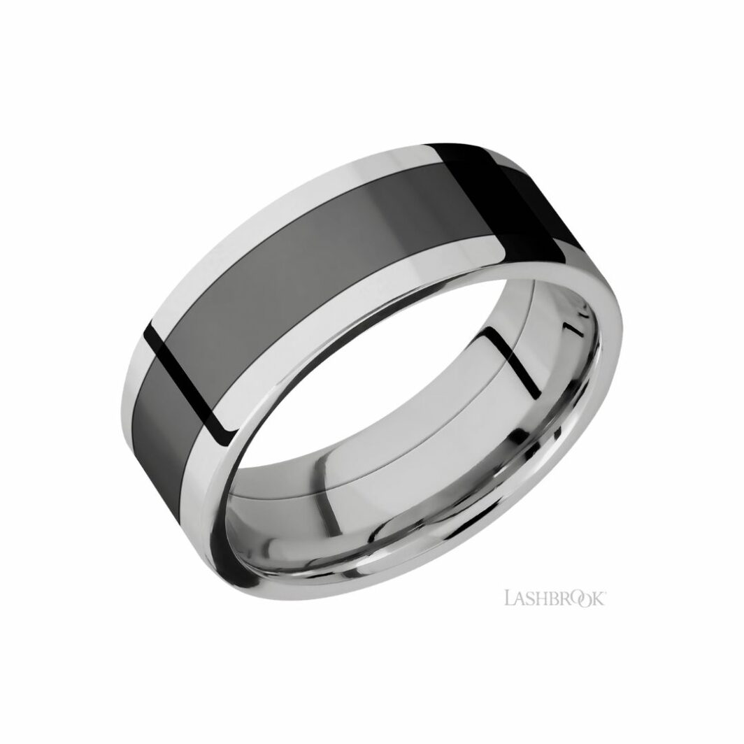 a black and white wedding band with an inlay