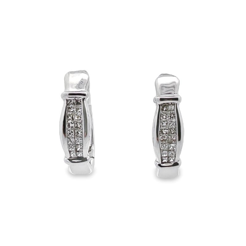 pair of earrings with diamonds on white background