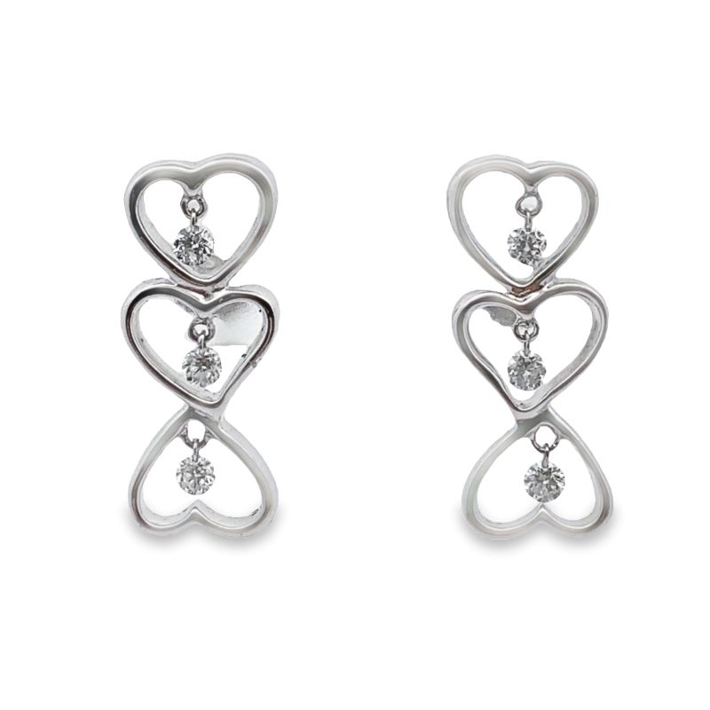 two hearts shaped earrings with diamonds on them