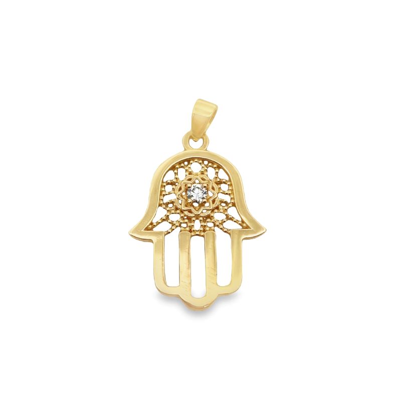 a gold hamsa pendant with a diamond in the center