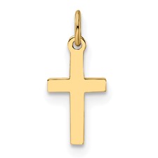 a gold cross charm on a white background