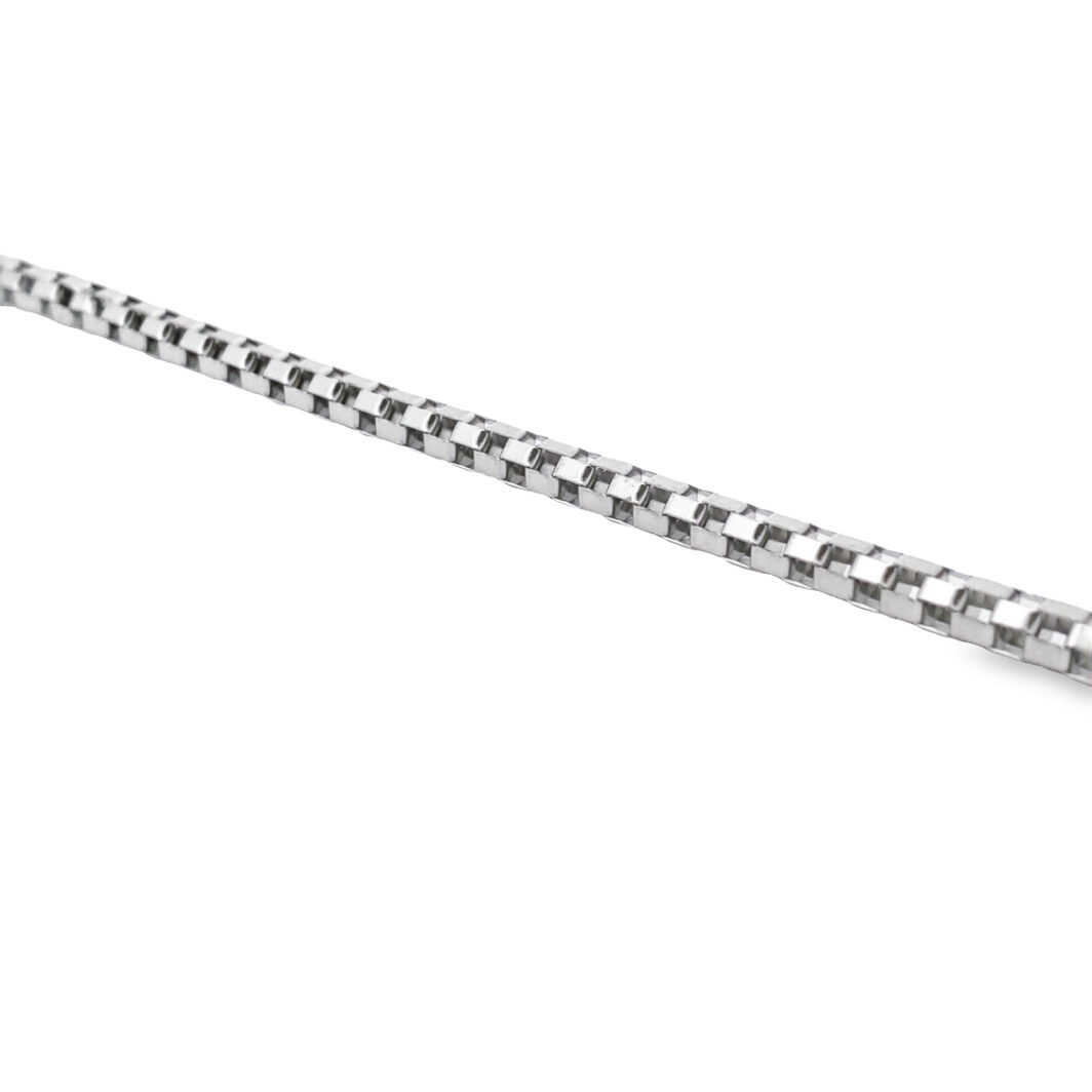 a metal chain is shown on a white background