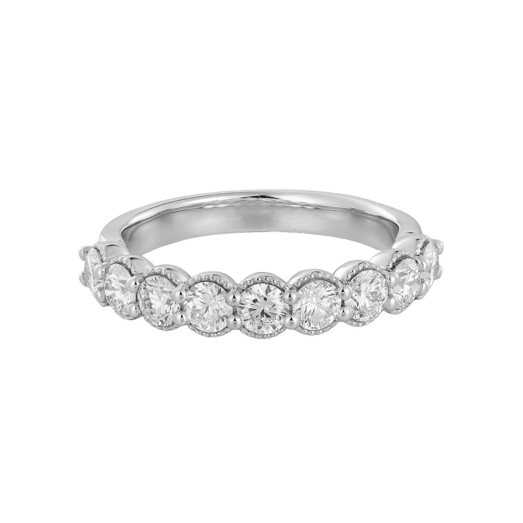 a white gold wedding band with five diamonds