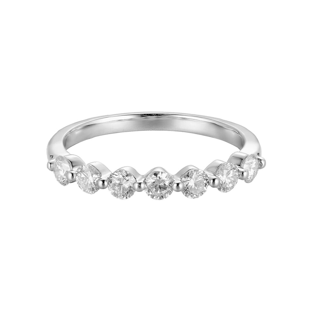 a white gold ring with five diamonds