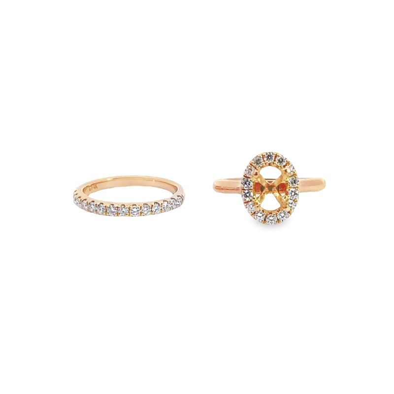 two gold rings with orange and white diamonds