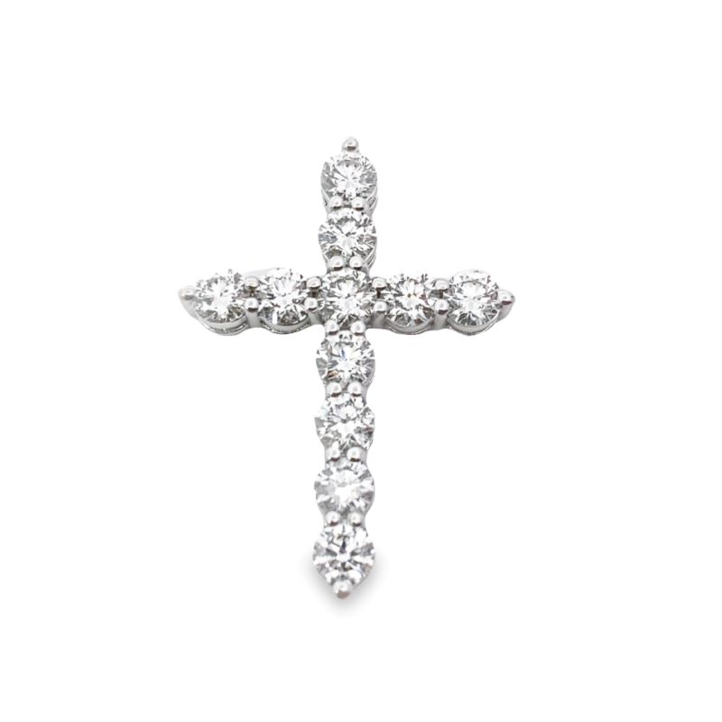 a diamond cross pendant on a white background