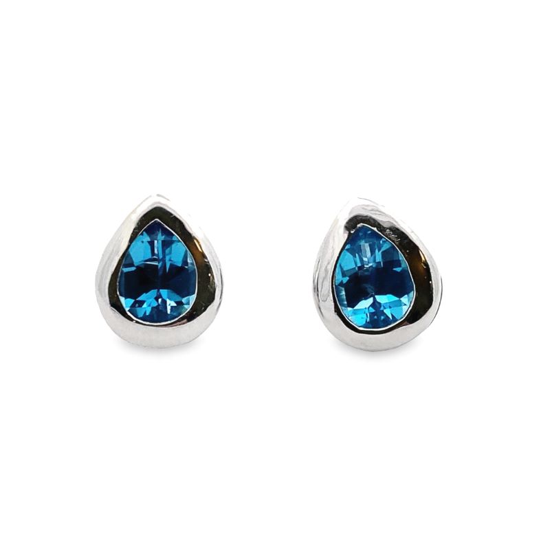 a pair of earrings with blue stones