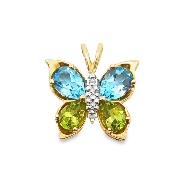 a butterfly shaped brooch with blue, green and yellow stones