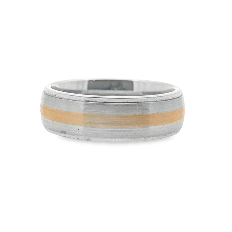 a wedding ring with two tone gold inlays