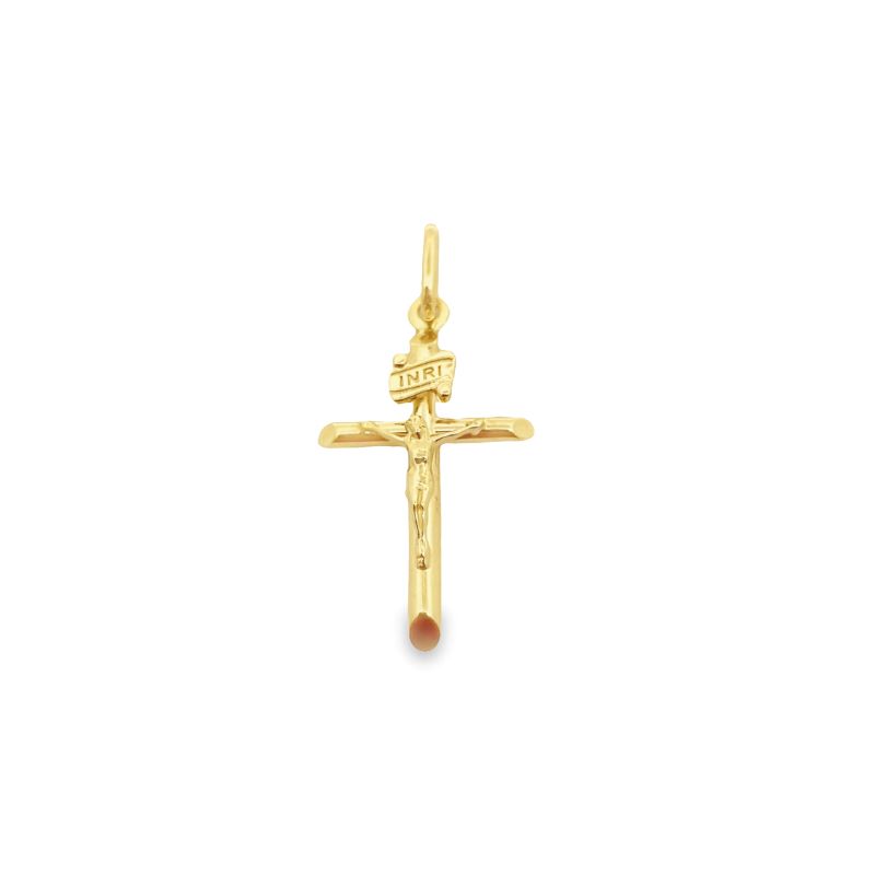 a gold cross with a red stone in the center
