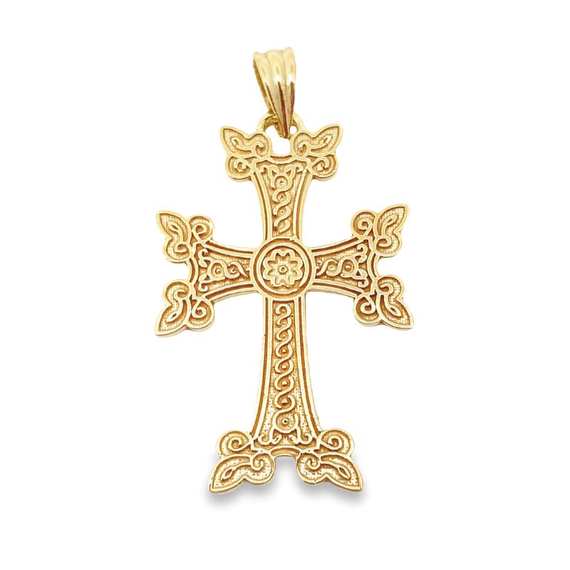 a gold cross pendant on a white background