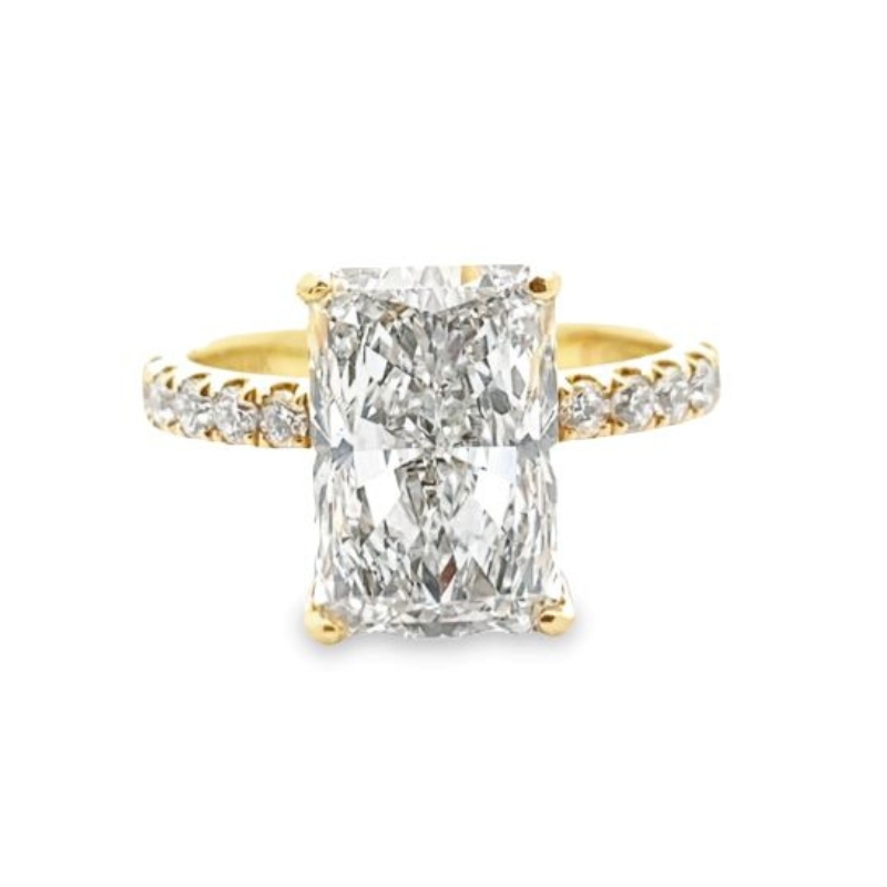 a princess cut diamond ring with pave set shoulders