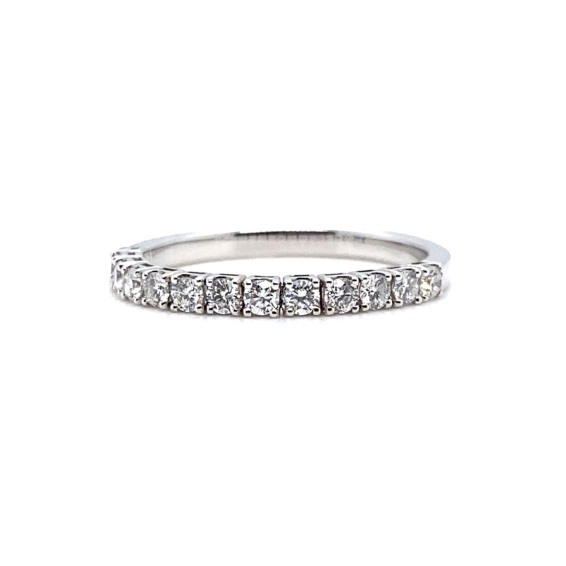 a white gold ring with five princess cut diamonds