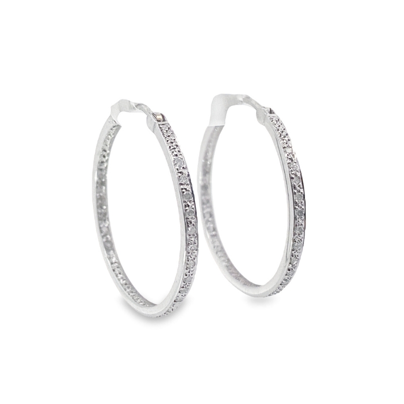 a pair of silver hoop earrings with small diamonds