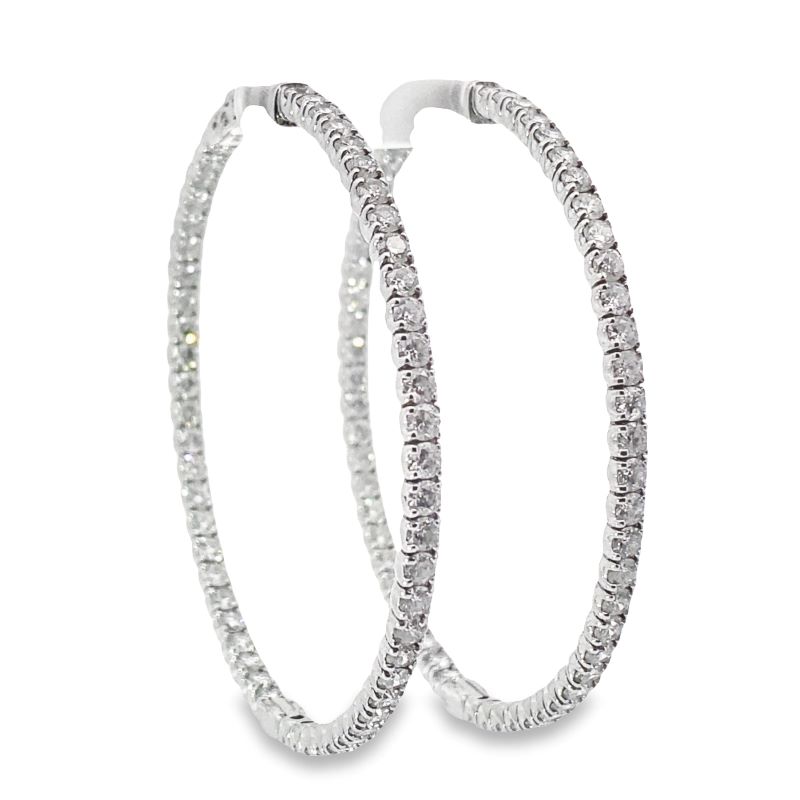 pair of white gold and diamond hoop earrings