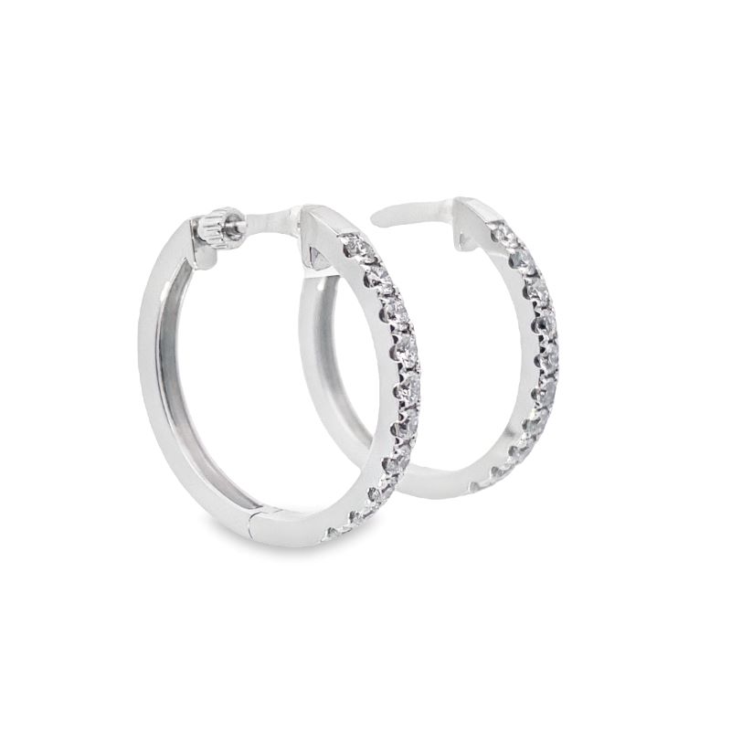 pair of silver hoop earrings with crystal stones