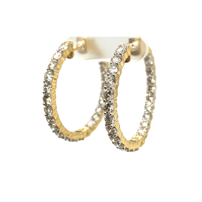 two tone gold hoop earrings with white and clear stones