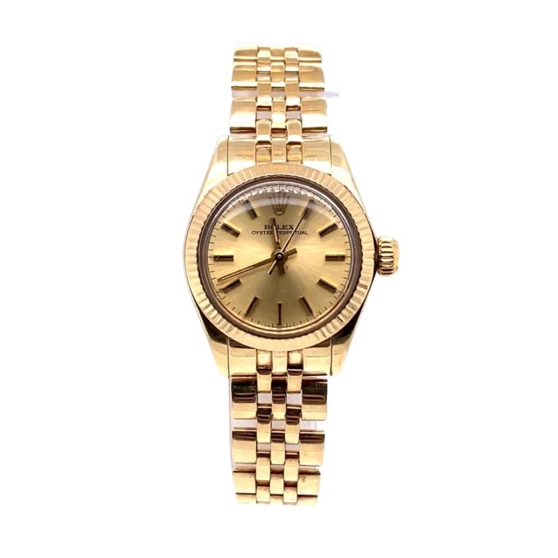 a gold rolex watch on a white background