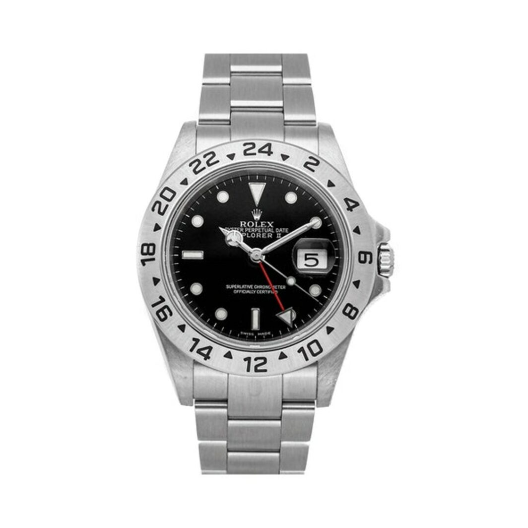 a rolex watch with black dials on a steel bracelet