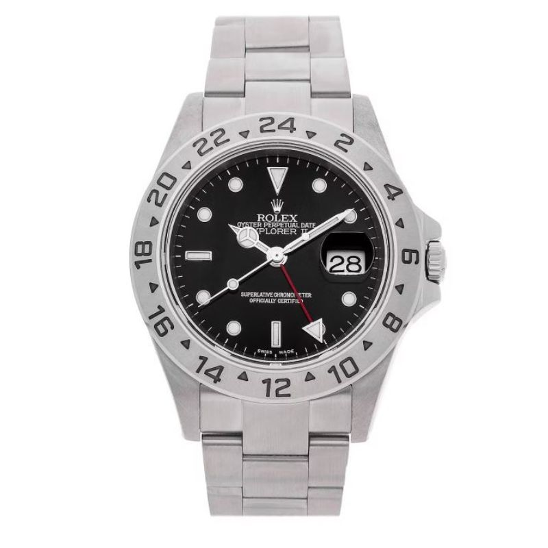 a rolex watch with black dials and red hands