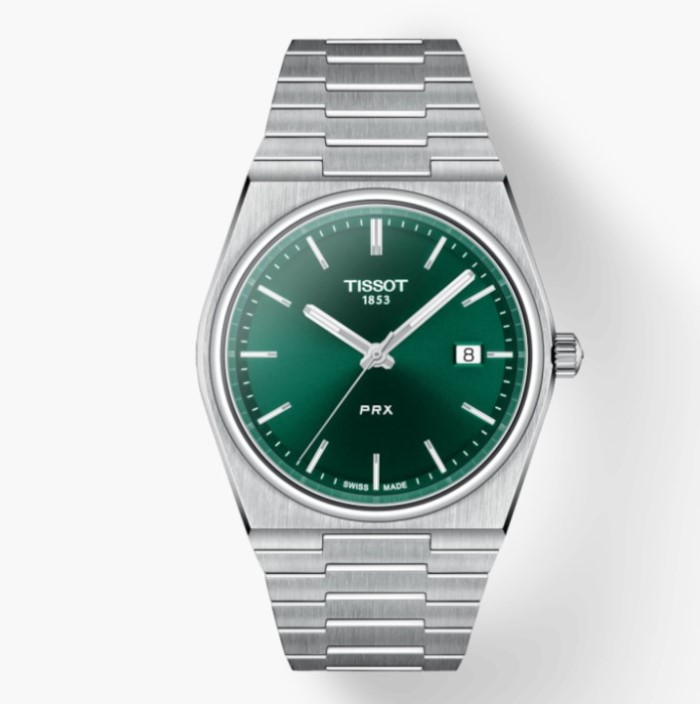a watch with green dials on a white background