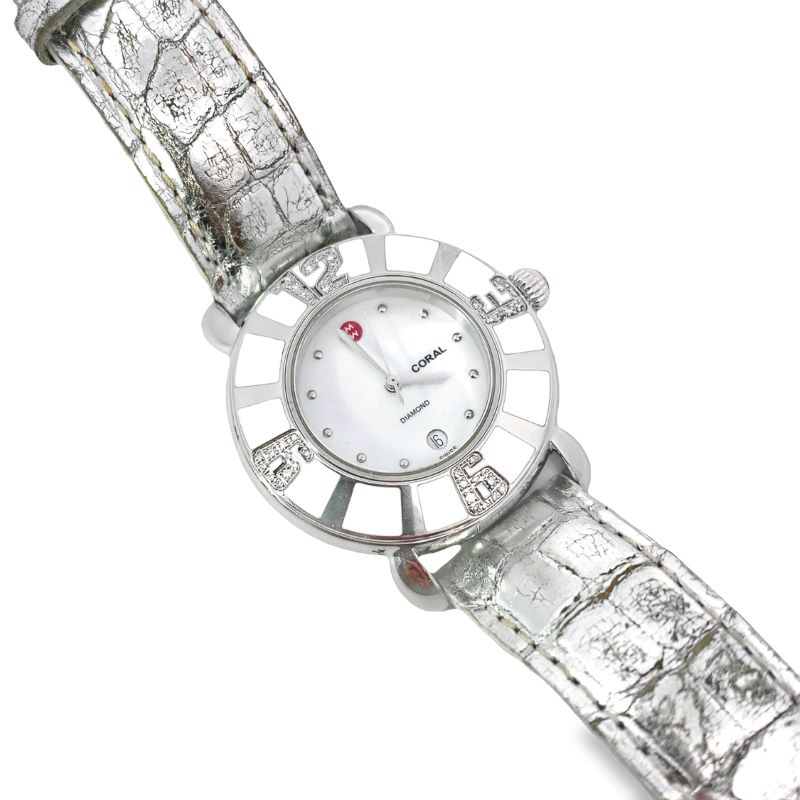 a watch with white dials and diamonds on the face