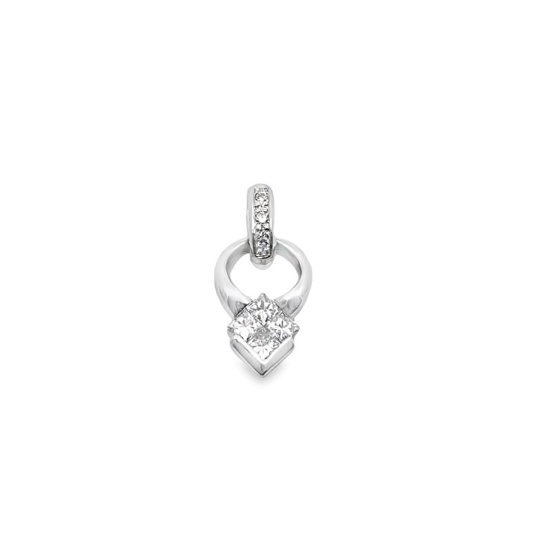 a white gold ring with a heart shaped diamond