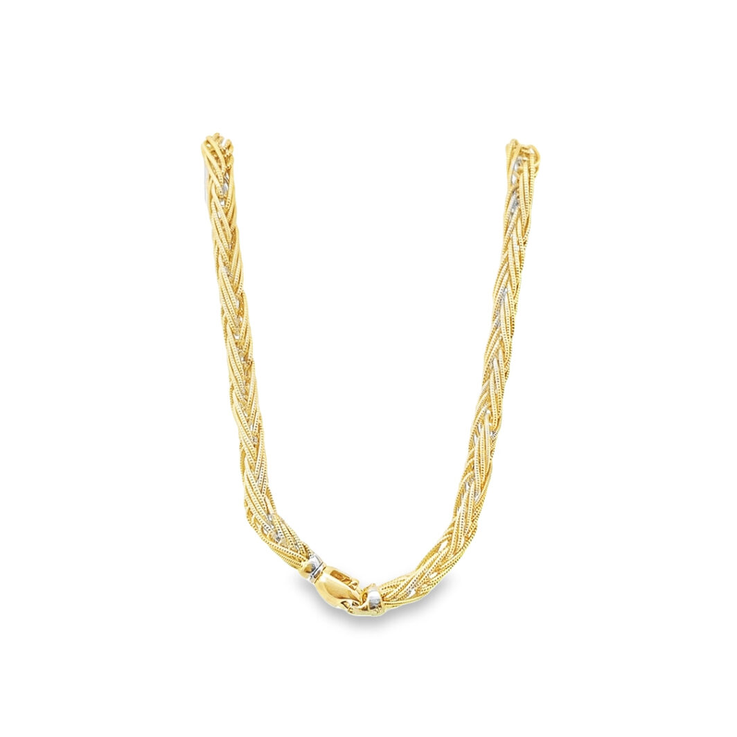 a yellow gold necklace with diamonds