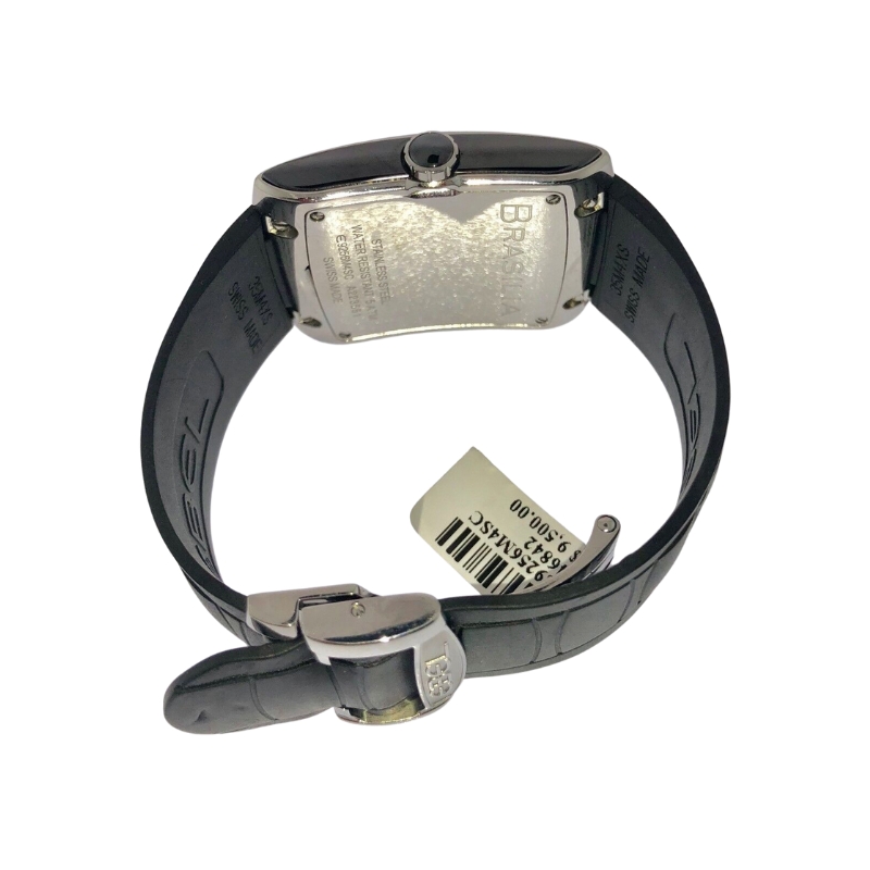 a wrist watch with a tag attached to it