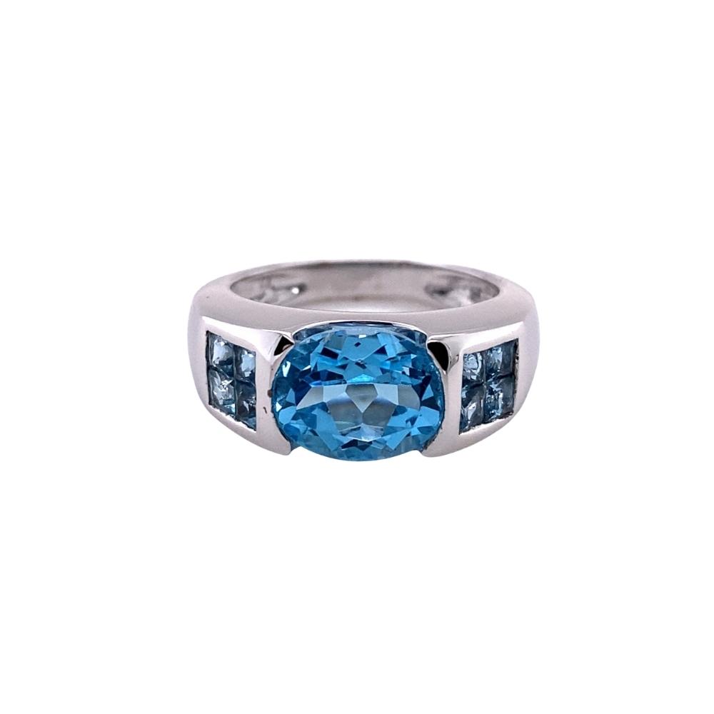 Contemporary Ring with Oval and Princess Cut Blue Topaz, 5.00ctw, 14kt white gold.