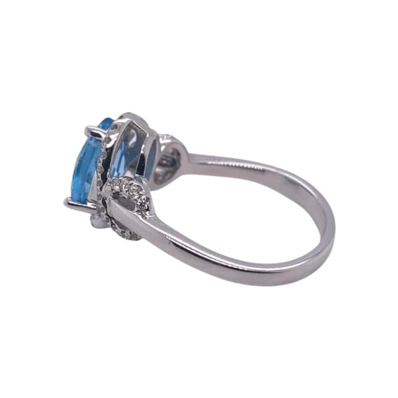 Tilted Swiss Blue Topaz and Looped Diamond Halo Cocktail Ring - Image 2
