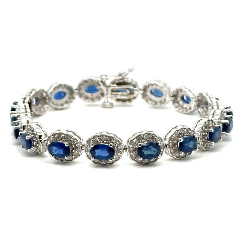 10ctw Oval Blue Ceylon Sapphire and 2.50ctw Halo Diamond Bracelet